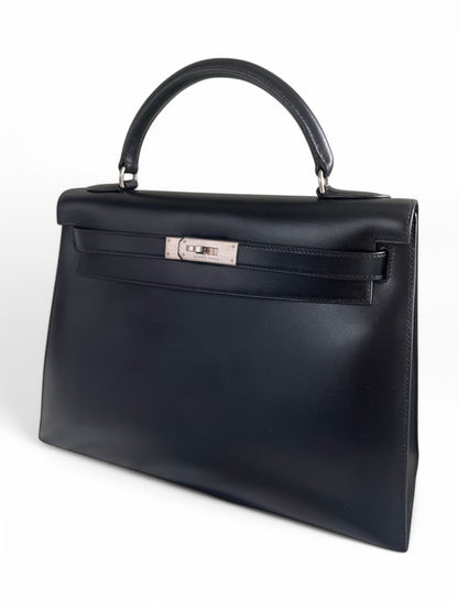 Hermès Kelly Handbag Noir Box Calf With Guilloche Palladium Hardware 32